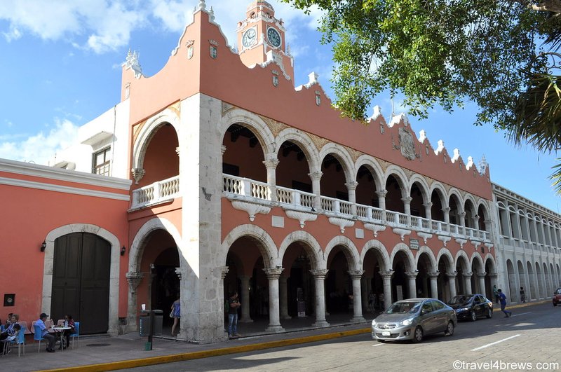 The colorful and architecturally distinct government building aligns well with the article's focus on unique and authentic spots.